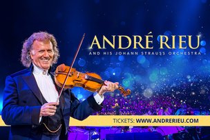 Der berühmte Geiger André Rieu trägt einen eleganten Anzug und spielt leidenschaftlich auf seiner Violine vor einer festlichen Kulisse.